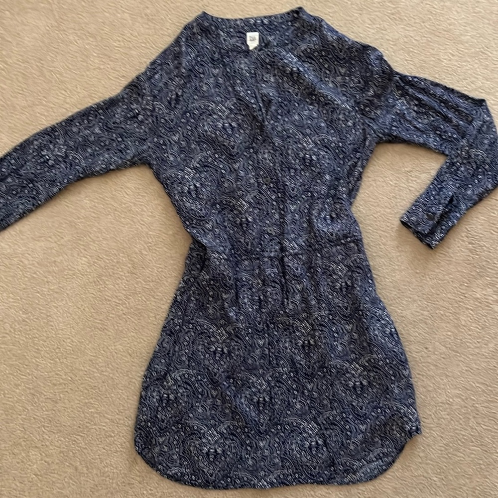 Blue with accent., small but fits medium easily